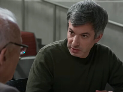 A quiet moment of mentorship—or the set-up for an elaborate emotional trapdoor?