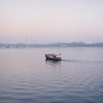 Tomoko Yoneda, from the series Scene, Wedding - View of the wedding party on the river that divides North Korea and China, Dandong, China 2007 © Tomoko Yoneda
