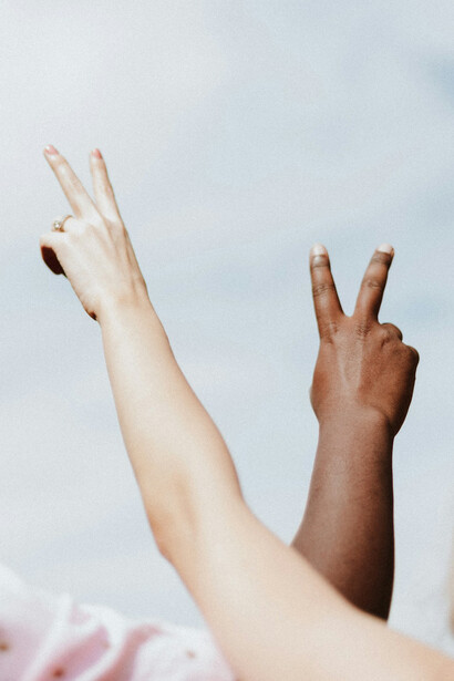 The victory sign-humanity will win only when education is oriented around better values