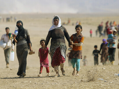 Familias iraquíes que intentan huir de la 
