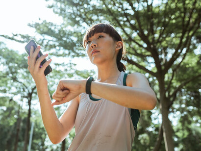 Empowered by her fitness tracker, she's not just exercising, she's part of a movement transforming the future of sports