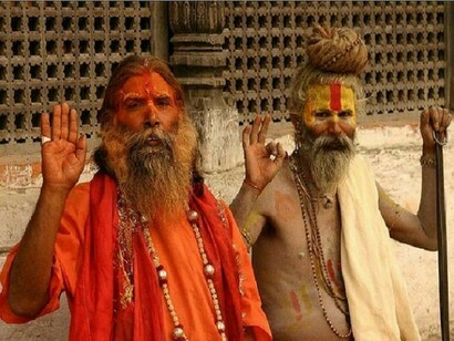Two old Indians saying hello to the camera