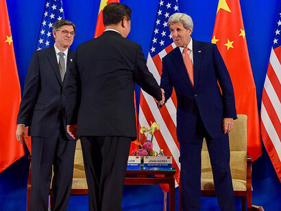 On June 6, 2016, U.S. Secretary of State John Kerry shook hands with Chinese President Xi Jinping at the Diaoyutai Guest House in Beijing, China, while U.S. Treasury Secretary Jack Lew looked on, ahead of the opening session of a two-day Strategic and Economic Dialogue between the two nations