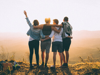A group of friends watch the sunset, the law of dependency and social being