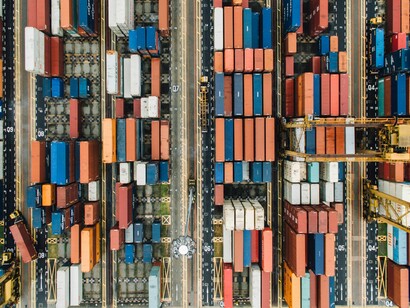 Assorted shipping containers in dock