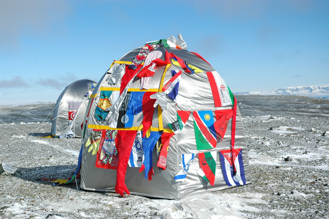 Window on the World - Antarctica, 2007
Diptych window frames, Lambda photograph laminated, mirror, glass, 38 plasma bottles, used clothes, flags, copper pipes, 2 taps, 105 x 17 x 134 cm
Courtesy of the artists. Photo: Bertrand Huet
