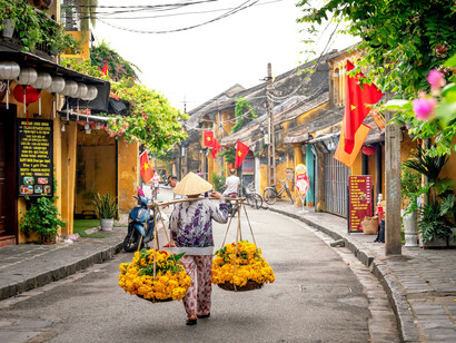 The historic streets of Hoi An, Vietnam, come alive with colorful lanterns, local visitors, and beautifully preserved heritage buildings