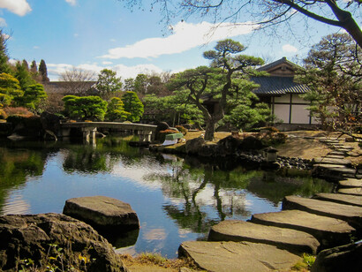 Traditional Japanese-style housing with garden scenery, capturing the essence of Japan’s architectural and landscape design