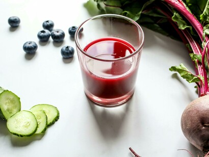 A beet and blueberry juice close up, rich in vitamin C and K