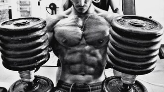 Before an international competition, Francesco is preparing to perform chest bench-presses with 62kg weights
