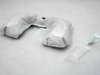 Rowena Harris, The fundamental ergonomics of body meets machine, 2015, neck cushion inflated with concrete, cast silicon rubber, sealed plastic containing one breath, 56 x 30 x 9 cm