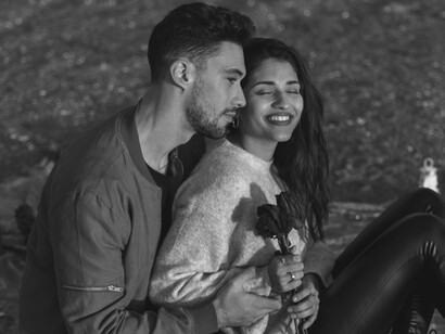 A quiet, intimate moment shared between them, highlighting the comfort and safety she felt in his arms