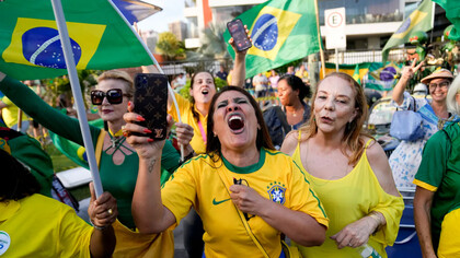 Brazilians gather during the voting of the presidential elections