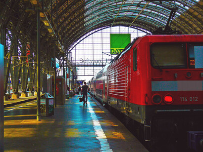 The central railway station in Frankfurt am Main, Germany, serves as a major hub for public transport, featuring locomotives and modern rail services that connect various regions and cities across the country