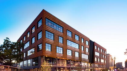 The striking metal panels on this modern building not only enhance its aesthetic appeal but also offer durability and sustainability, making it a top choice for innovative architecture