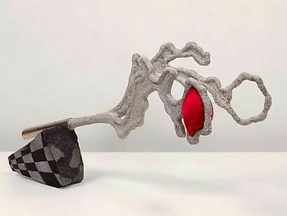 John Newman, Discussion stick with a hot spot, 2014, stone, wood, satin, felt, cotton bunting, nylon micro-filament, papier mâché, acqua resin, graphite wood, acrylic paint, palladium leaf, 16 x 12 x 30 inches