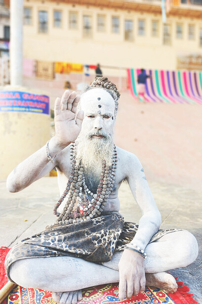 An Aghori at a ghat in Varanasi, Ganges River, India