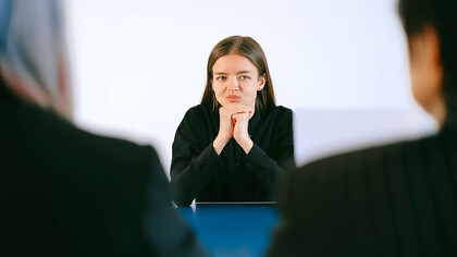 A woman who wants to get the job goes through the interview process