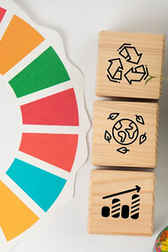 This still life image represents the 17 SDGs, aiming for a sustainable future by addressing poverty, inequality, climate change, and more