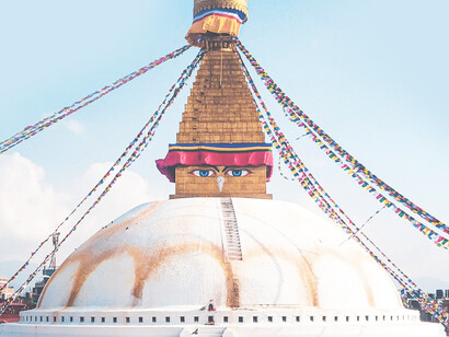 In Kathmandu, devotees walk around the luminous white dome of Boudhanath, its Buddha eyes observing their every step, while stopping by nearby monasteries and schools for prayers and educational seminars