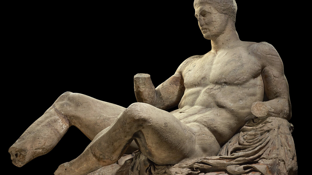 A figure of a naked man, possibly Dionysos. Marble statue from the East pediment of the Parthenon. Designed by Phidias, Athens, Greece, 438BC-432BC. © The Trustees of the British Museum
