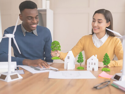Colleagues collaborate on an environment project, focusing on eco-friendly buildings and sustainable construction materials and designs