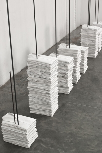 Doris Salcedo, Untitled (camisas), 2013, Cloth shirts, metal rebars, and plaster in 11 parts. Photo: Oscar Monsalve Pino. Courtesy Alexander and Bonin, New York
