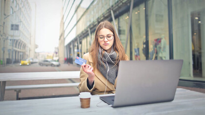 A shopper excitedly discovers the endless possibilities of today's digital marketplace, where nearly anything is within reach with just a few clicks