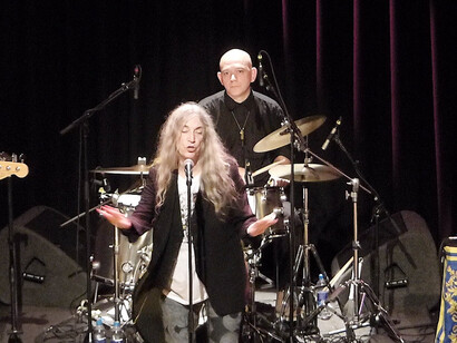 Patti Smith is a powerful activist whose work addresses themes of displacement and human suffering