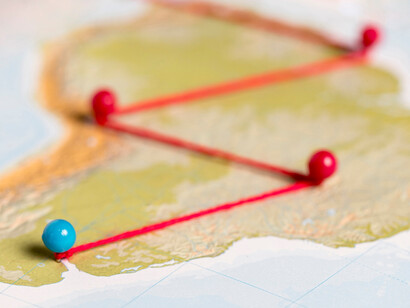 A map with a red thread linking different regions: in deglobalization, commerce becomes local instead of global