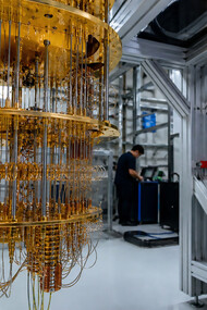 A state-of-the-art quantum computing laboratory featuring a cryogenic quantum processor and advanced computing systems, reflecting the rapid transition of quantum technology from experimental research to real-world industrial applications
