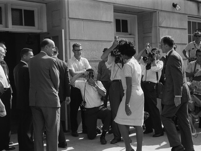 African-American university student Vivian Malone entering the University of Alabama in the U.S. to register for classes as one of the first non-white student