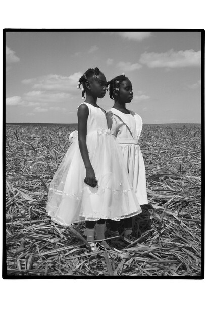 Carmen Ballvé, Batey (Girls in White), 2005, gelatin silver print, 14x11 inches. Courtesy the artist and Throckmorton Fine Art, NYC