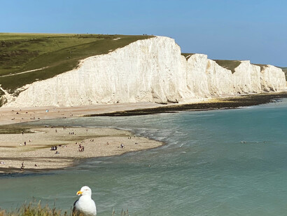 A coastal cliff facing the open sea in England, United Kingdom
