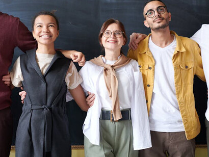 Smiling team members, happy and content with their work environment, fiercely loyal to one another and to the goals that they are chasing together