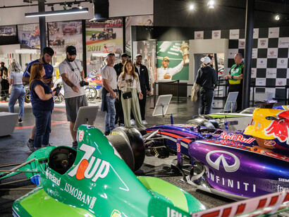 Visitors can explore a diverse collection of racing memorabilia, iconic race cars, and interactive exhibits that showcase the technological advancements and human stories behind the sport