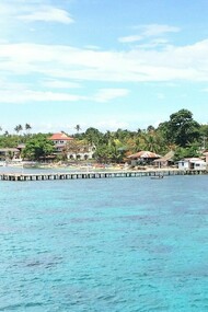 The Ormoc Pier stretching into the sea, symbolising Ormoc’s role as a gateway for people, trade, and opportunity