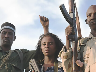 Interim Juba Administration forces celebrate rescuing hostages abducted by Al-Shabaab, aided by AMISOM Kenya Defence Forces air surveillance