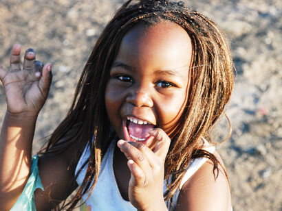 Smiling and engaged, she represents the aspirations of many young South Africans striving for educational success