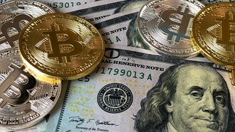 Bitcoins and US dollar bills. A recession can have significant effects on the global economy
