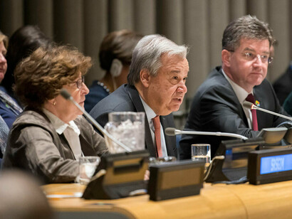 Secretary General António Guterres (centre) delivers his report entitled “Making Migration Work"