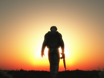 A solitary soldier walking into the sunset echoes Ramparts Magazine’s critique of the human cost of the Vietnam War