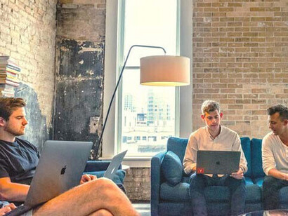 People at work engaging in effective communication