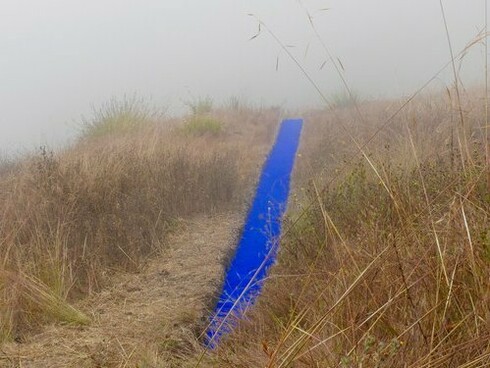 Lita Albuquerque's “Malibu Line,” an ultra-vivid blue earthwork that connects earth, ocean, and sky in Malibu, California, USA