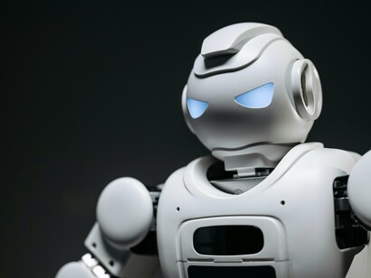 An AI robot standing as a singular entity, illustrating how AI is often perceived as a monolith rather than a system