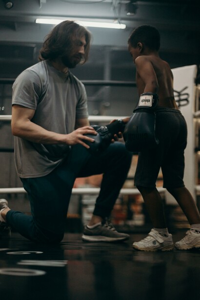 Coach and his trainee, box