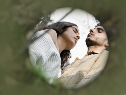 Two people in nature, practice conscious awareness with their eyes closed