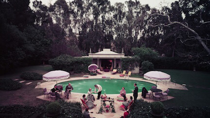 Slim Aarons Scone Madame?, circa 1960: Guests gather around pool at home of interior decorator James Pendleton. “The Beverly Hills home of interior decorator James Pendleton, later owned by Robert Evans, motion picture executive of Paramount Pictures Corporations, c. 1960” 
