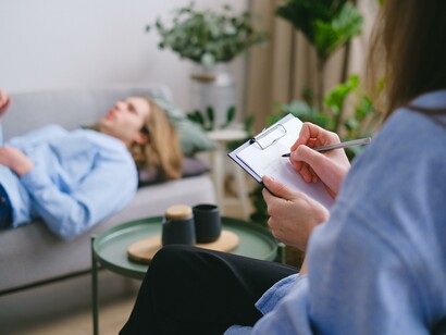 A person speaking to a therapist to get help with their OCD
