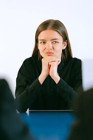 A woman who wants to get the job goes through the interview process